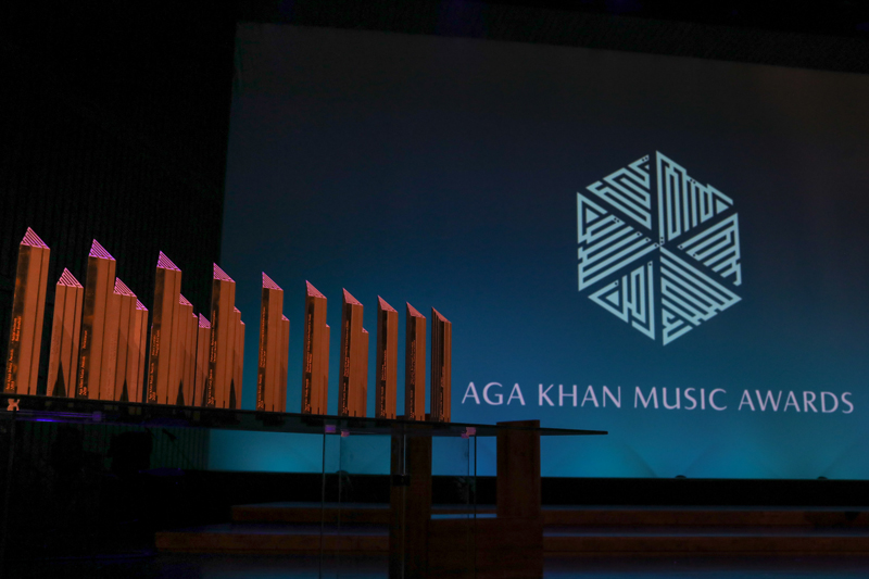 Aga Khan music awards. An image of the awards on a table on stage.