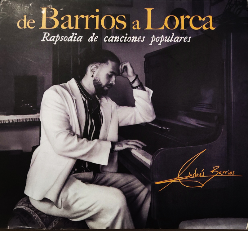 Andrés Barrios - De Barrios a Lorca: Rapsodia de Canciones Populares cover artwork. The artist sitting by a grand piano in a thoughtful mood.