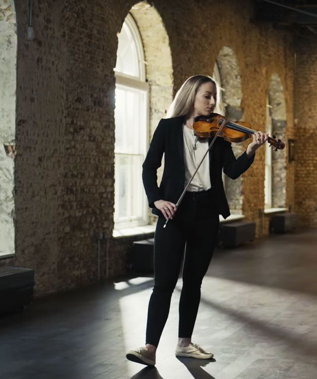 Aoife Ní Bhriain from the Wonder video, playing violin