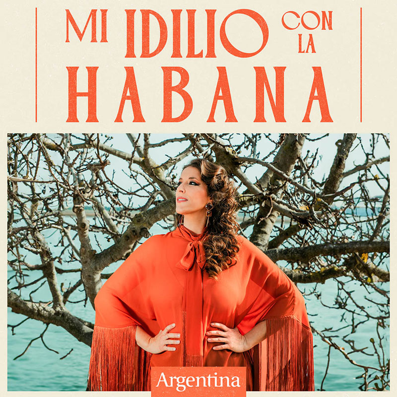 Argentina - Mi idilio con La Habana cover artwork. The artist posing in a tradiitonal flamenco dress in front of a tree.