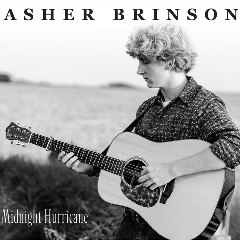 Asher Brinson — Midnight Hurricane cover artwork. A black and white photo of Asher playing acoustic guitar outdoors.