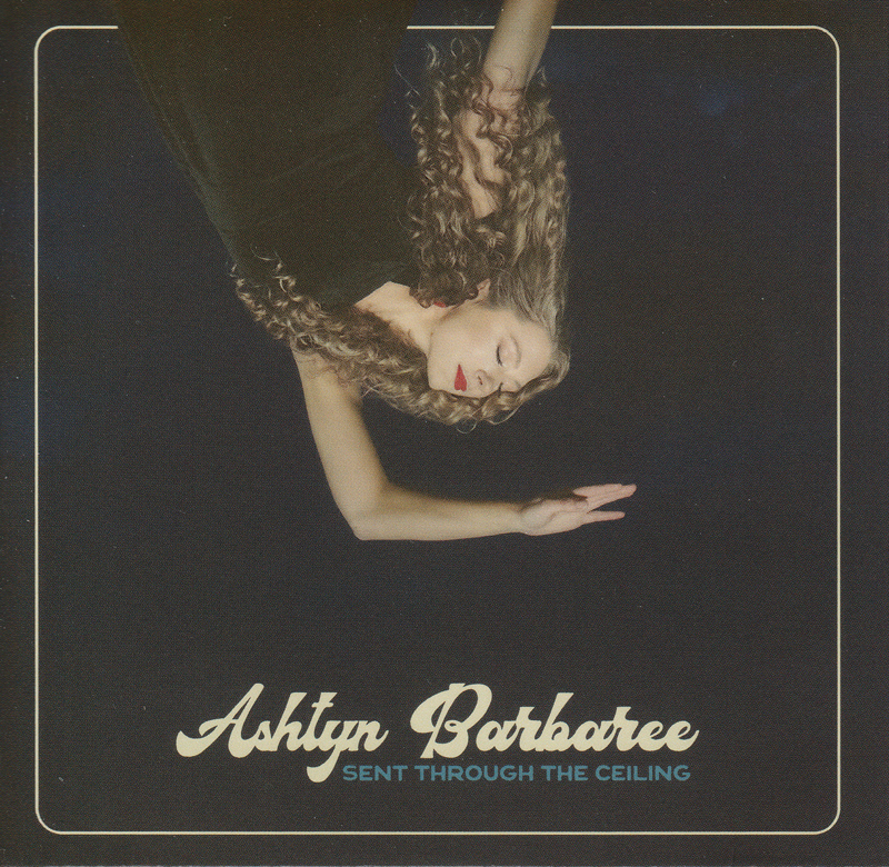 Ashtyn Barbaree - Sent Through the Ceiling cover artwork. A photo of the artist upside down.