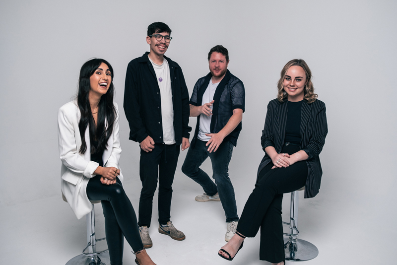 Astro Bloc band photo. Two women and two men.