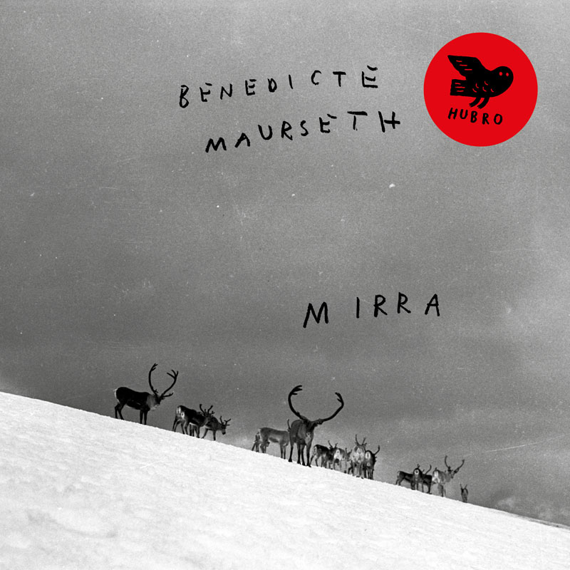 A black-and-white winter landscape stretches across the cover, where a small herd of reindeer stands silhouetted along a snow-covered ridge beneath a vast sky. Hand-drawn lettering spells out the artist’s name and the album title.