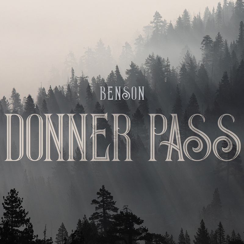 Benson - Donner Pass cover artwork. A mountain range with trees.