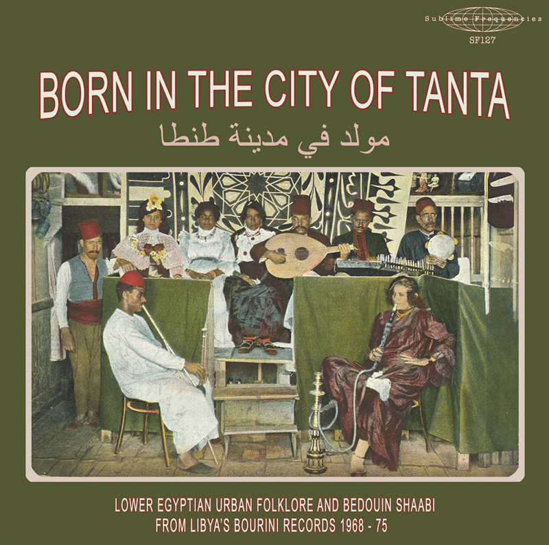 The album cover for Born in the City of Tanta presents a vintage photograph of a traditional Egyptian musical gathering. Musicians in red fezzes and embroidered garments play instruments like the oud, kanun, and tambourine, flanked by seated women in ornate dresses. The setting is framed by intricate decor and green drapery, while a hookah rests in the foreground.