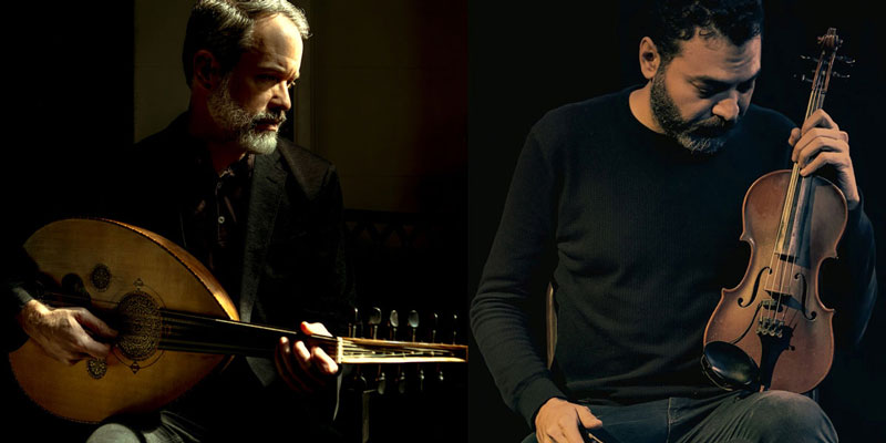 Brian Prunka on stage playing oud - Photo by Aidan Grant