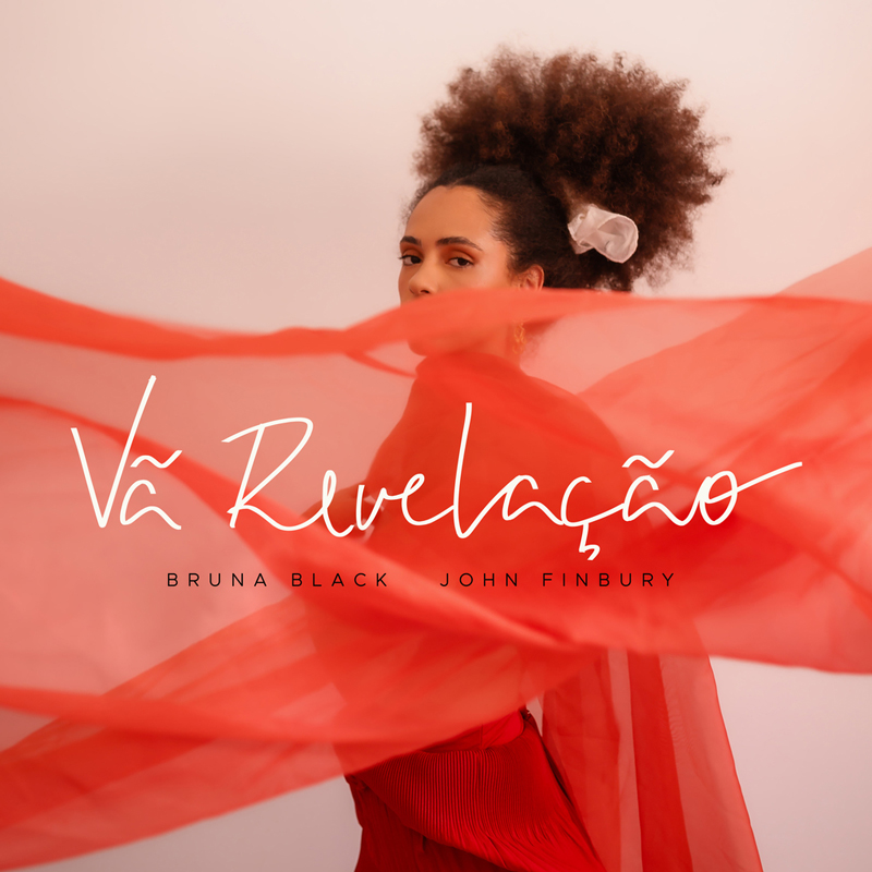 The album cover for Vã Revelação by Bruna Black and John Finbury features Bruna Black partially obscured behind a flowing red fabric. The album title, Vã Revelação, is elegantly scripted across the center, with the artists' names—Bruna Black and John Finbury—displayed in a modern font below.