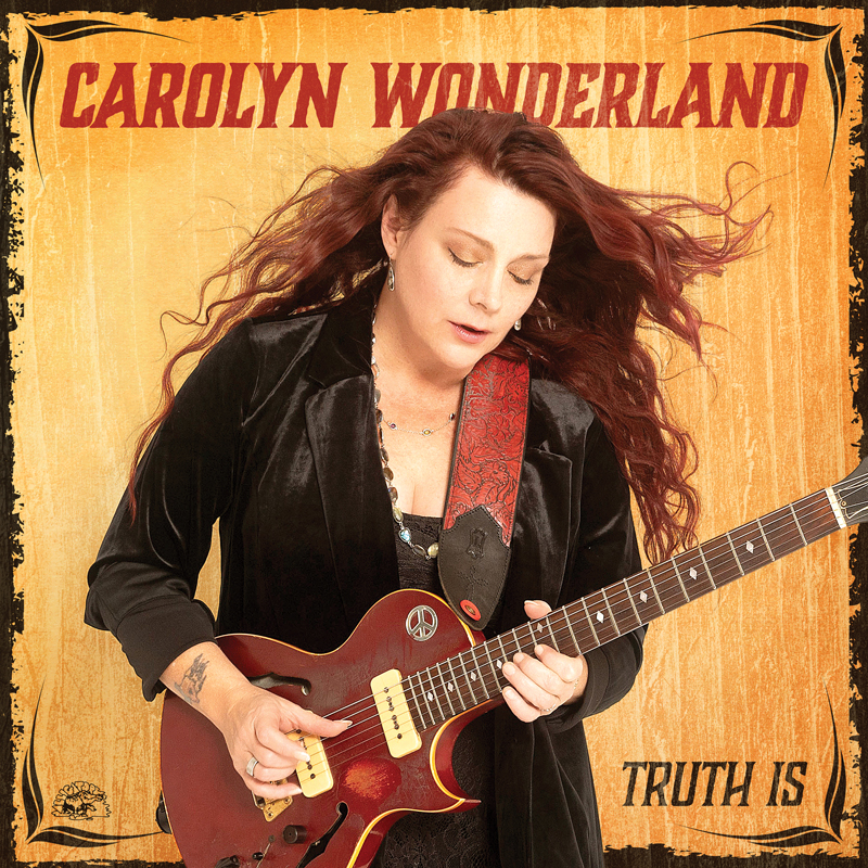 Carolyn Wonderland - Truth Is cover artwork. A photo of Carolyn playing guitar.