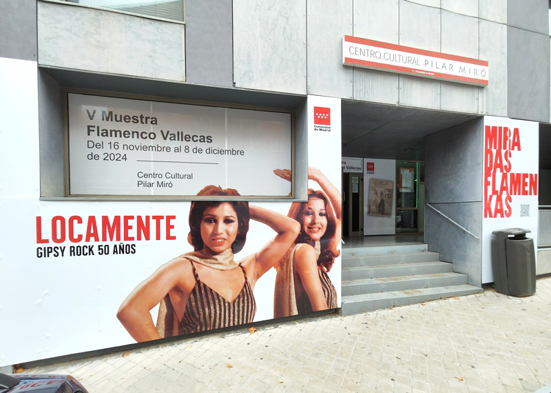 Centro Cultural Pilar Miró in Vallecas, Madrid. Experior of the building with a poster of the exhibition.