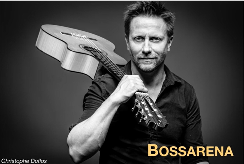 Christophe Duflos Bossarena single artwork. A photo of the artist holding a guitar over his shoulder.
