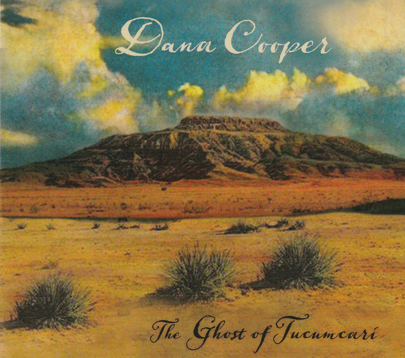 Dana Cooper - The Ghost of Tucumcari cover artwork. A photo of southwestern plains with a layered mountain in the bacvk.