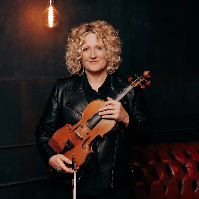 Deanie Richardson holding a fiddle