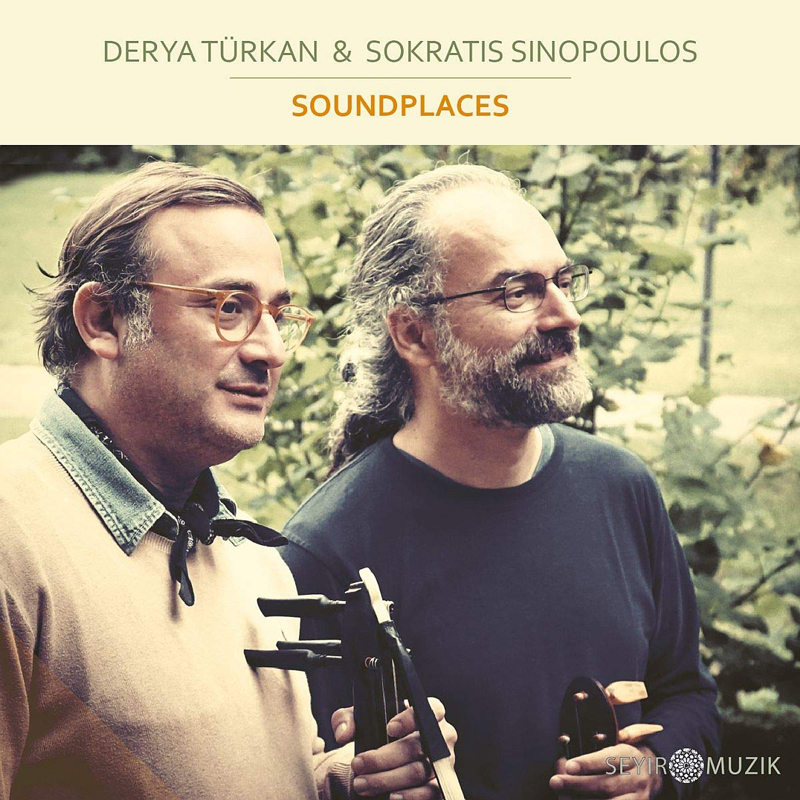 Derya Türkan & Sokratis Sinopoulos - Soundplaces cover artwork. a photo of the two artists side by side, looking to the right, holding their musical instrument.