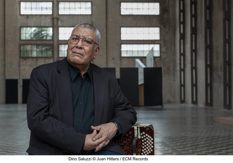 Dino Saluzzi posing next to his bandoneon