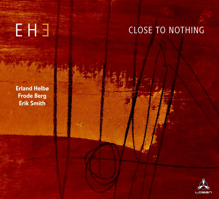 Deep red and burnt orange fields form an abstract, weathered background with thin black lines looping and crossing the surface. The group name appears on the left, while the album title Close To Nothing sits in small white type at the upper right. Three musician names stack beneath the band name, and a tiny record-label emblem rests in the lower corner.