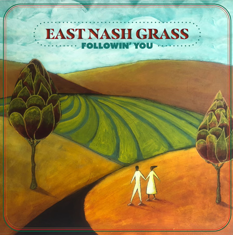 The cover for Followin’ You by East Nash Grass features a pastoral landscape with rolling hills, patchwork fields, and two tall, tree-like forms flanking a winding path. In the foreground, a simple white silhouette of a couple walks hand in hand. The title sits above in bold red and teal text, framed by retro border lines.
