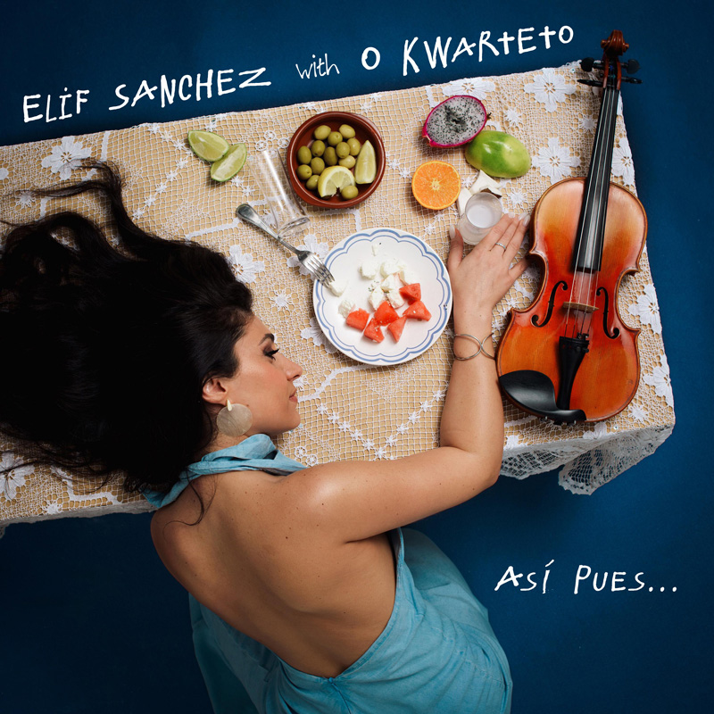 Elif Sanchez - Así pues… cover artwork. elif with her head resting on a table full of tapas and next to a violin.