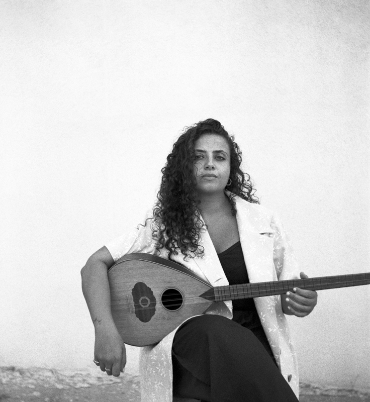 Farah Kaddour playing buzuq
