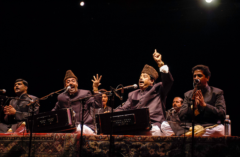 Fareed Ayaz ,Abu Muhammad - Photo by Jack Vartoogian Front Row Photos. Photo of a live performance.