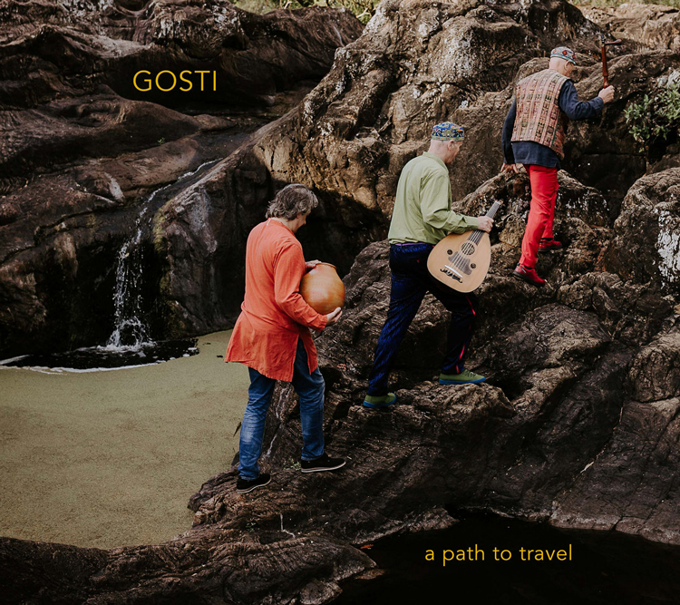 Gosti - A path to travel cover artwork. Shows the musicians climbing a hill carrying their musical istrumenbts.