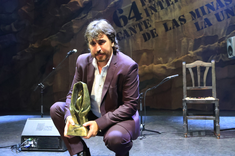 Gregorio Moya Lara - Photo courtesy of International Festival of Cante de las Minas. Gregorio holding his trophy.