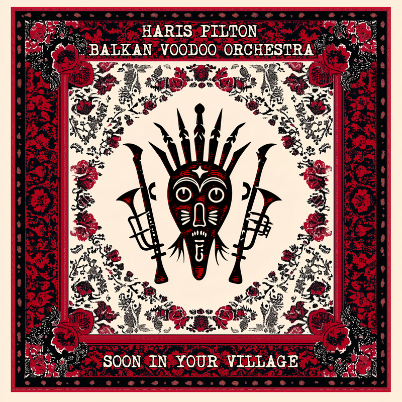 The album cover features a folkloric design with a central tribal mask flanked by two trumpets. Above, the artist name “Haris Pilton” and band “Balkan Voodoo Orchestra” appear in distressed white lettering on a dark red and black floral border. The bottom reads “Soon In Your Village” in the same vintage font. The artwork mixes Balkan textile motifs with voodoo iconography in a red, black, and cream palette.