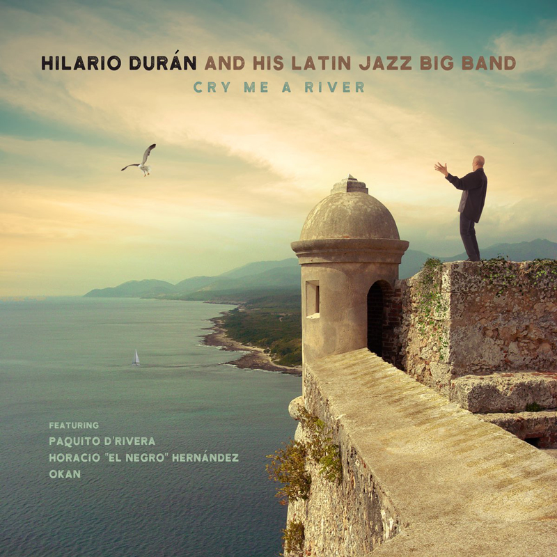 Hilario Durán - Cry Me A River cover artwork. The artist standing onthe wall of what seems like an old Spanish fort in Cuba, overlooking the sea.
