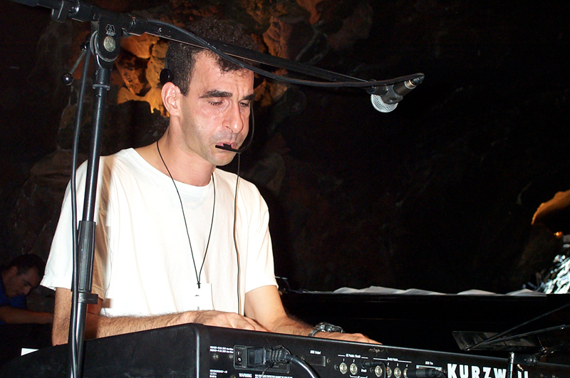 Jamshied Sharifi playing keyboards - Photo by Angel Romero