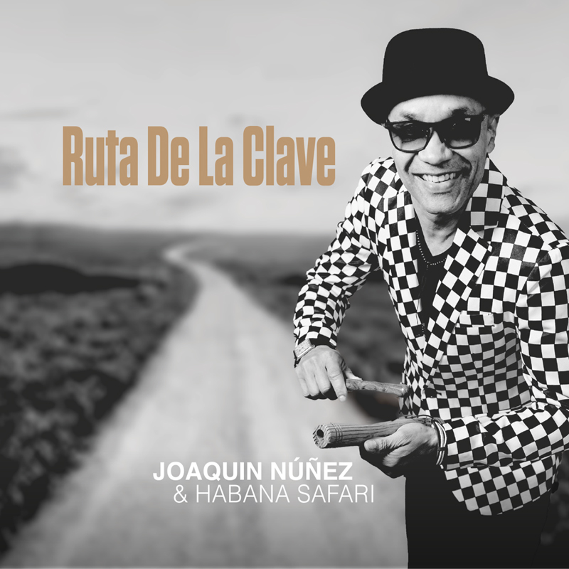 Joaquin Núñez & Habana Safari - Ruta De La Clave cover artwork. a photo of Joaquin next to a road.