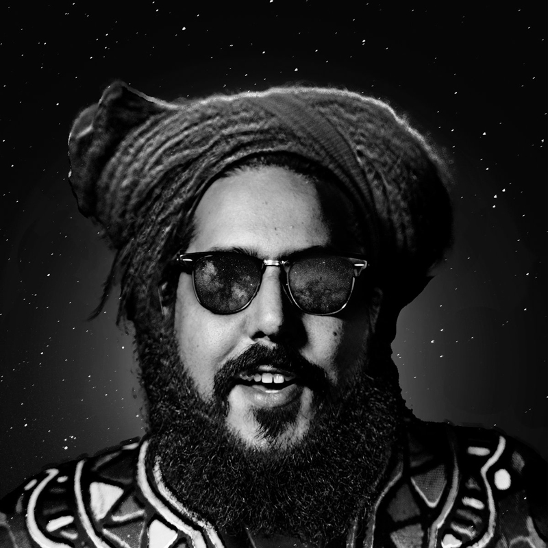 Julian Belbachir - Babdoukkala cover artwork. A photo of Julian wearing sunglasses