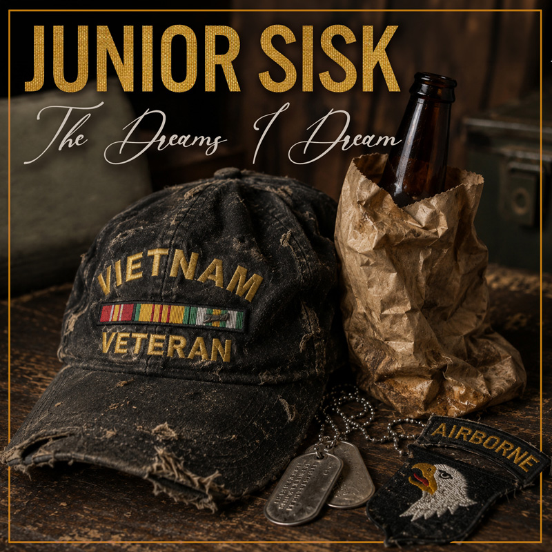 A cover with a worn Vietnam Veteran cap, military dog tags, an Airborne patch, and a brown beer bottle in a crumpled paper bag on a weathered wooden surface.