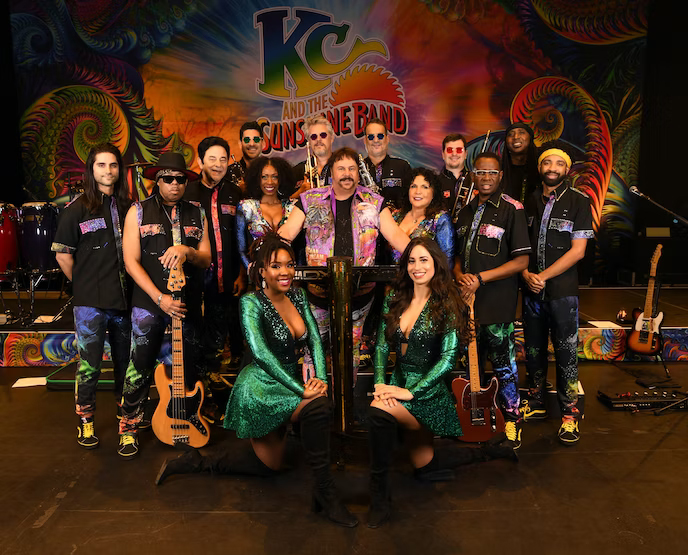 KC and The Sunshine Band ensemble photo posing for camera