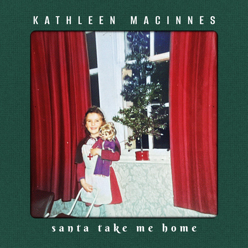Kathleen MacInnes -Santa Take Me Home cover artwork. A photo of a little girl by a Christmas tree.