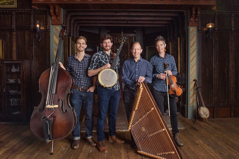 Ken & Brad Kolodner band photo. Four musicians holding their musical instruments.