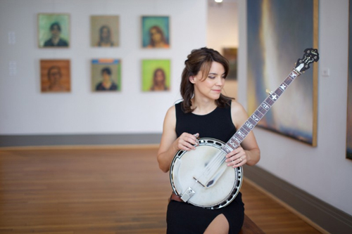 Kristin Scott Benson holding her banjo