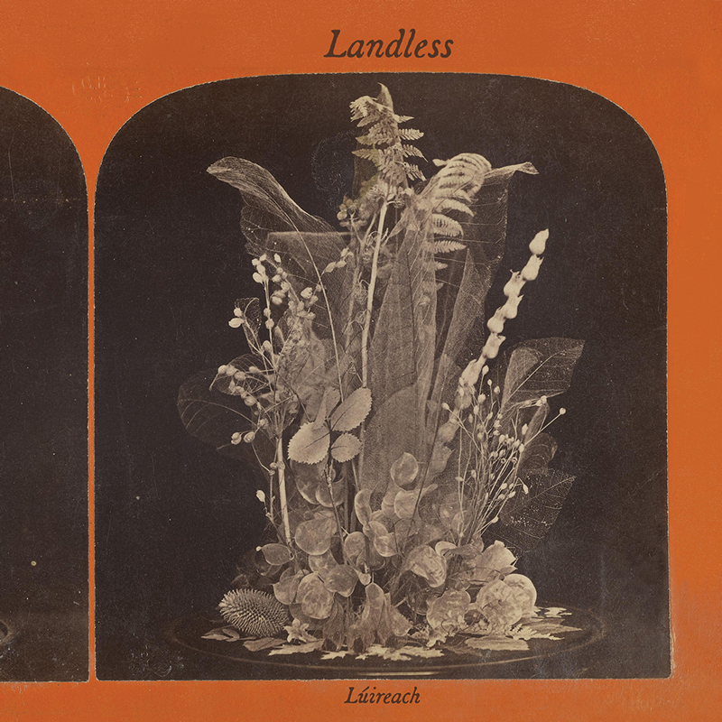 Landless - Lúireach cover artwork. The image features a vintage, sepia-toned aesthetic, framed by an orange border. The central composition depicts a delicate arrangement of botanical elements, including leaves, flowers, and ferns, appearing as though preserved or captured in a timeless, almost ethereal state.