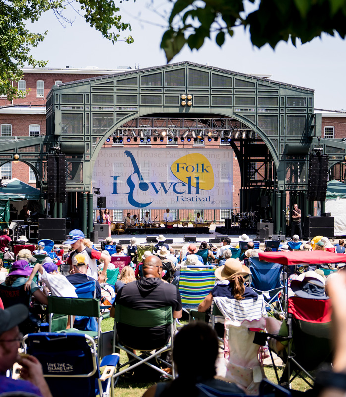 Lowell Folk Festival Boarding House Park. A shot of the audience from behind. Photo credit: credit LMTLSS Media.