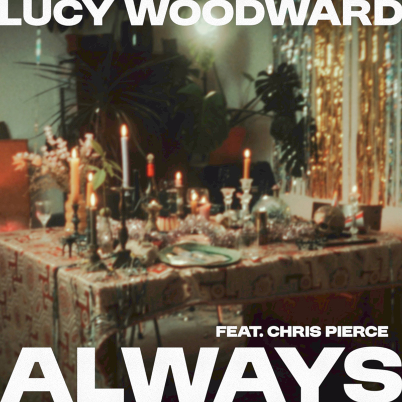 Lucy Woodward Always cover artwork. A blurry image of a table with candles, wine glasses and other objects.