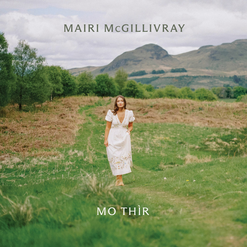Mairi McGillivray - 'S Mòr mo Chùram cover artwork. Mairi wearing a white dress standing in a grass field.
