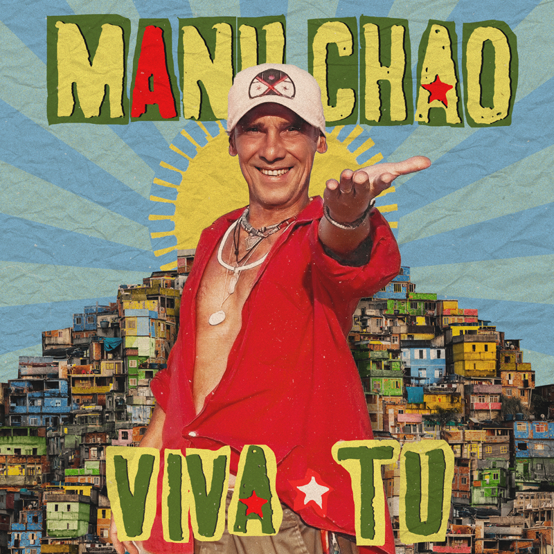 Manu Chao - Viva Tu cover artwork. A photo of Chao looking towardsthe camera, etending his left hand, n front of a colorful hill settlement.