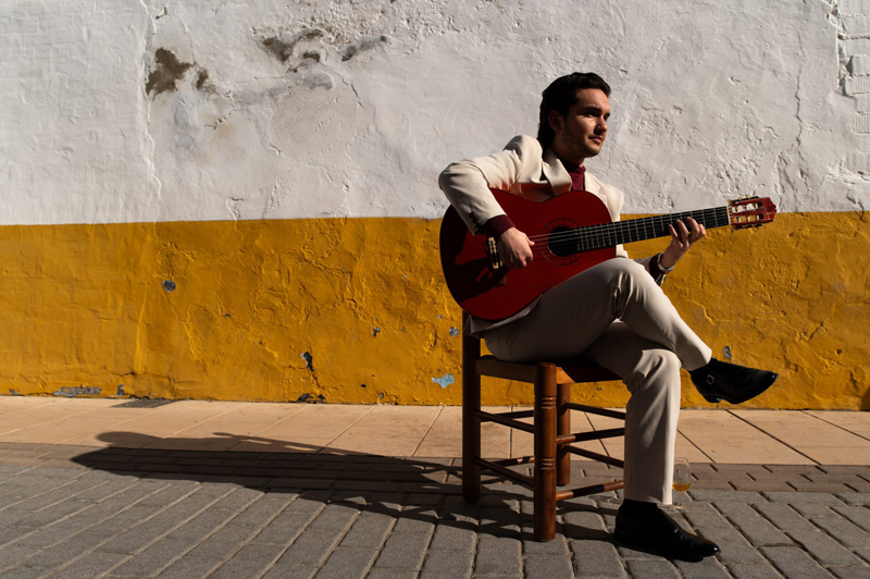 Manuel Cerpa playing guitar outdoors