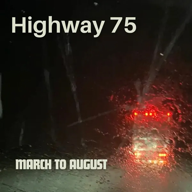 March To August - Highway 75 cover artwork.. a photo of the back of a tractor trailer driving during a storm.