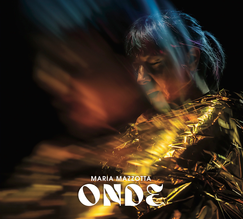 Maria Mazzotta - Onde cover artwork. a headshot of the artist with light rays going through.