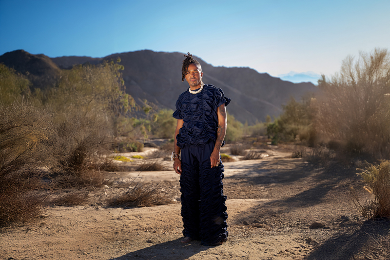 Matt B standing in the middle of a rural path.