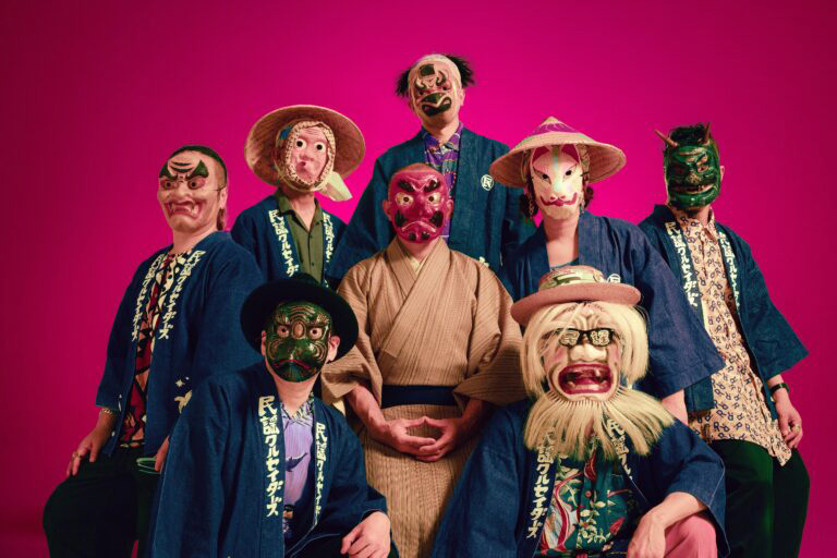 Minyo Crusaders - photo by Yukitaka Amemiya. the musicians were wearing traditional masks.