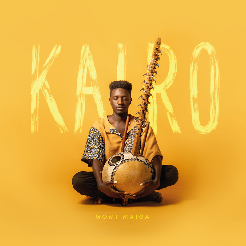 Momi Maiga - Kairo cover artwork. The artist sitting playing the kora.