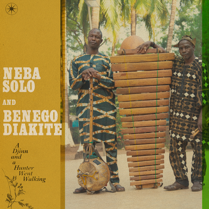 Neba Solo & Benogo Diakité - A Djinn and a Hunter Went Walking. A photo of the two artists outdoors holding their musical instruments.