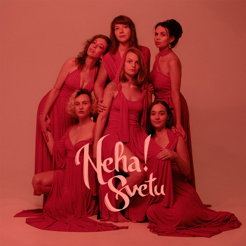 Neha! - Svetu cover artwork. A red-saturated photo of the six women.