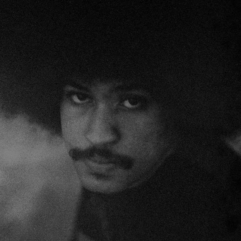 Nyron Higor - Nyron Higor cover artwork. A black and white photo of the artist. He has an afro and moustache.